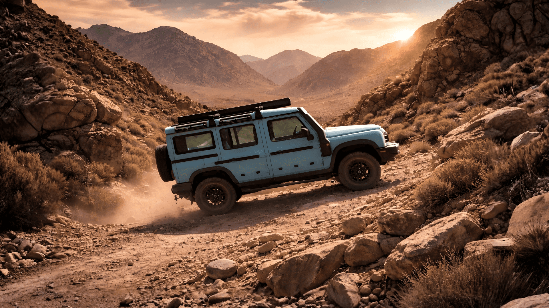 Light blue off-road SUV driving on a rocky trail in the Reno, Nevada high desert.