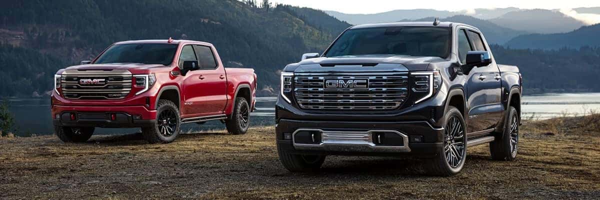 2 GMC Sierra's Parked on Mountain top