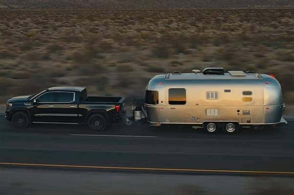GMC Sierra pulling a trailer