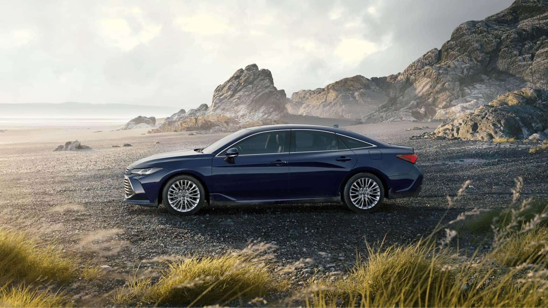 2021 Toyota Avalon on a coast line beach