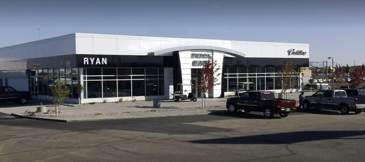 Exterior view of a Buick and GMC dealership in Minot