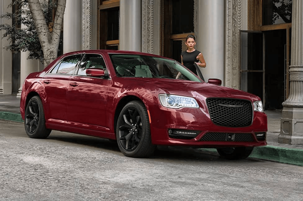 woman by parked 2023 Chrysler 300