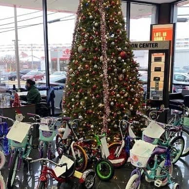 Bikes underneath a Christmas tree