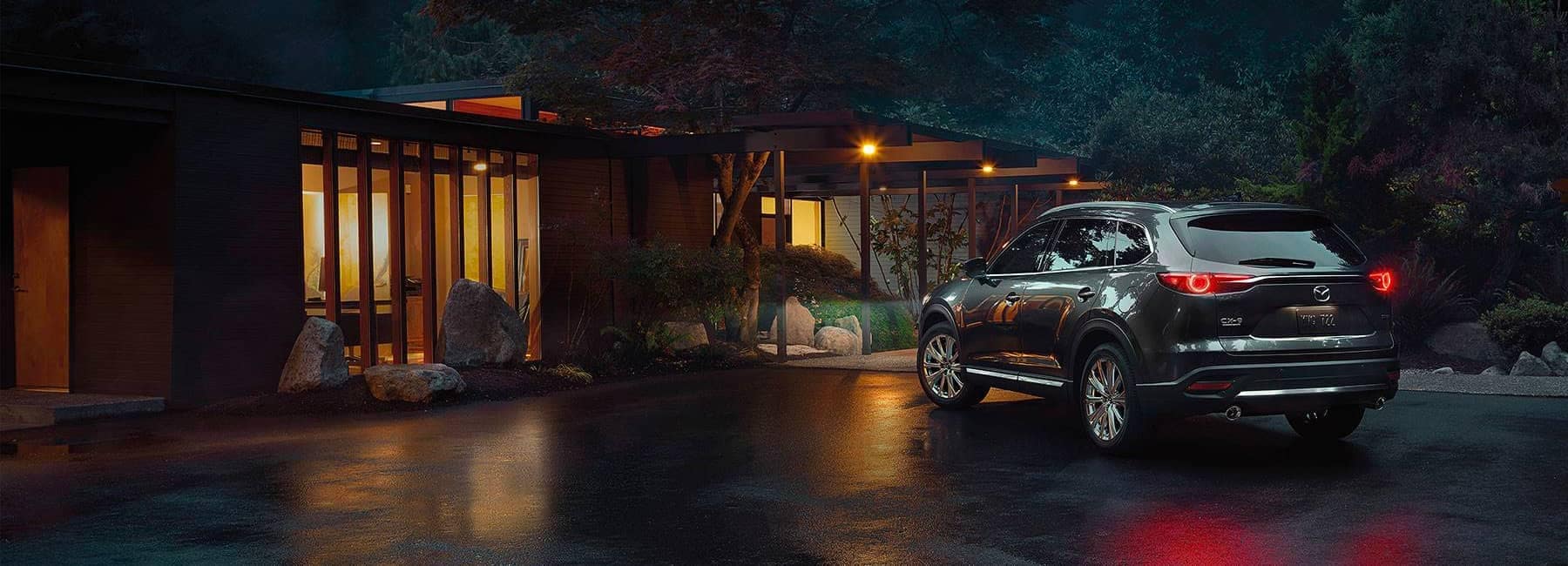 2022-Mazda-CX-9-back-view-exterior-parked-outside-home
