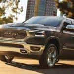 2019 Ram 1500 Driving Down Tree-Lined Street