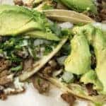 Steak and avocado tacos at Taqueria Los Pericos