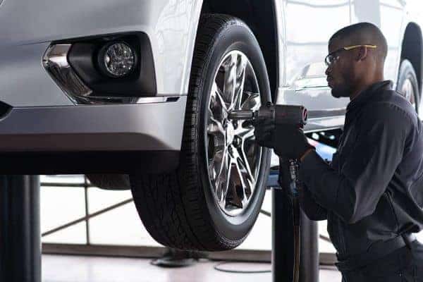 A mechanic changing a tire