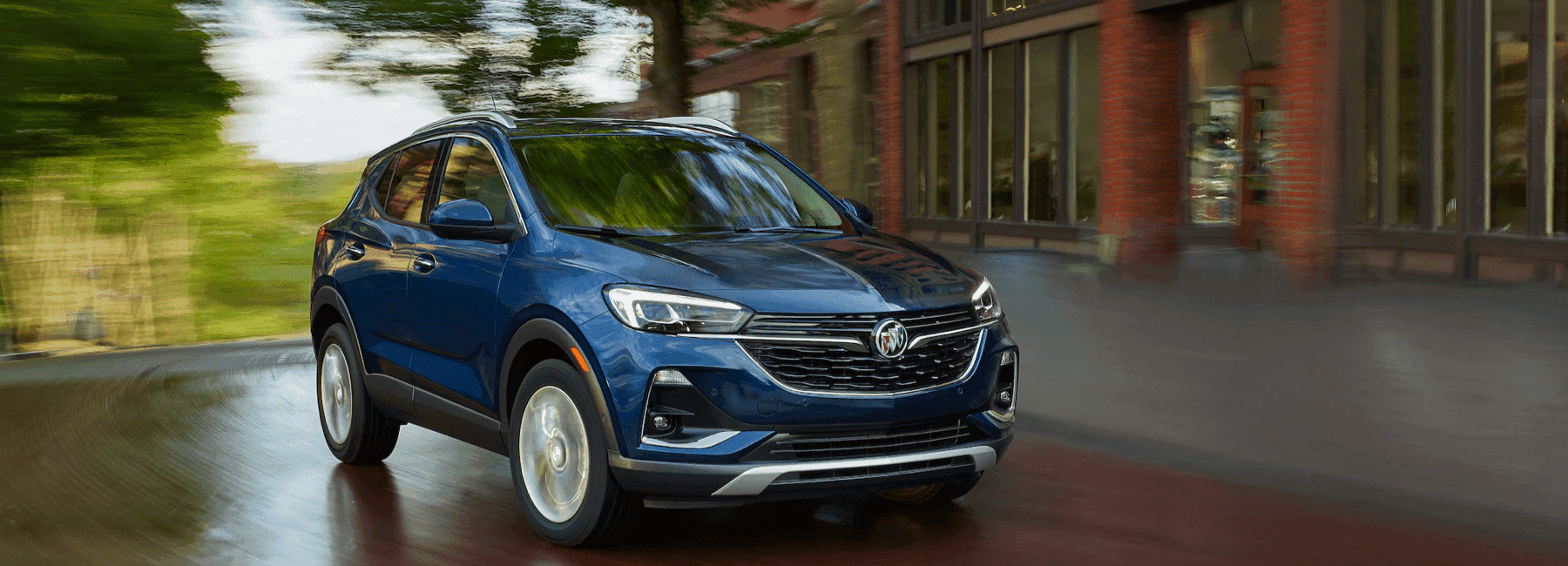 2020 Buick Encore GX speeds along city street
