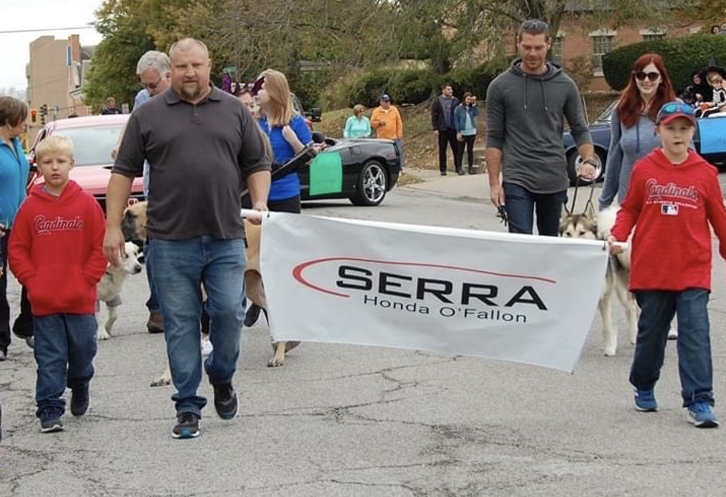 Serra Honda Banner in a parade
