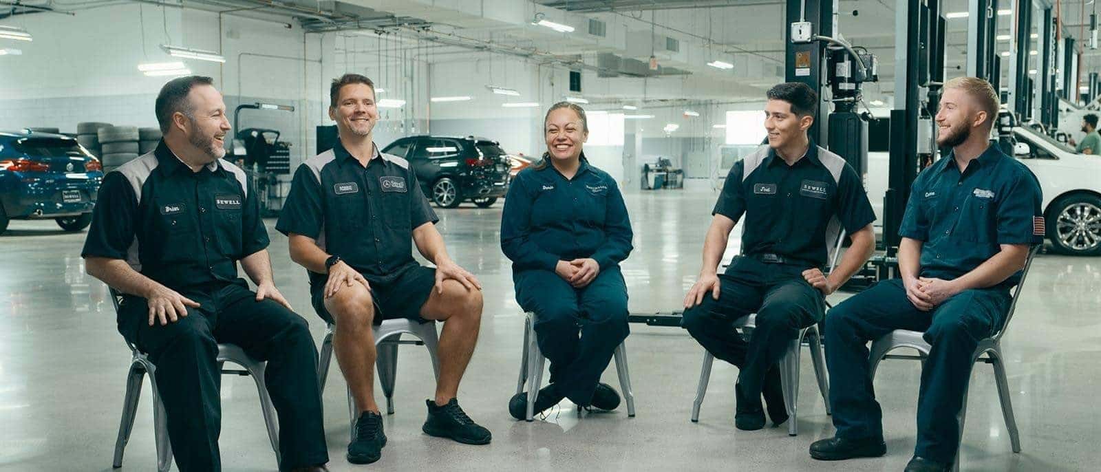 Sewell Technicians sitting and laughing