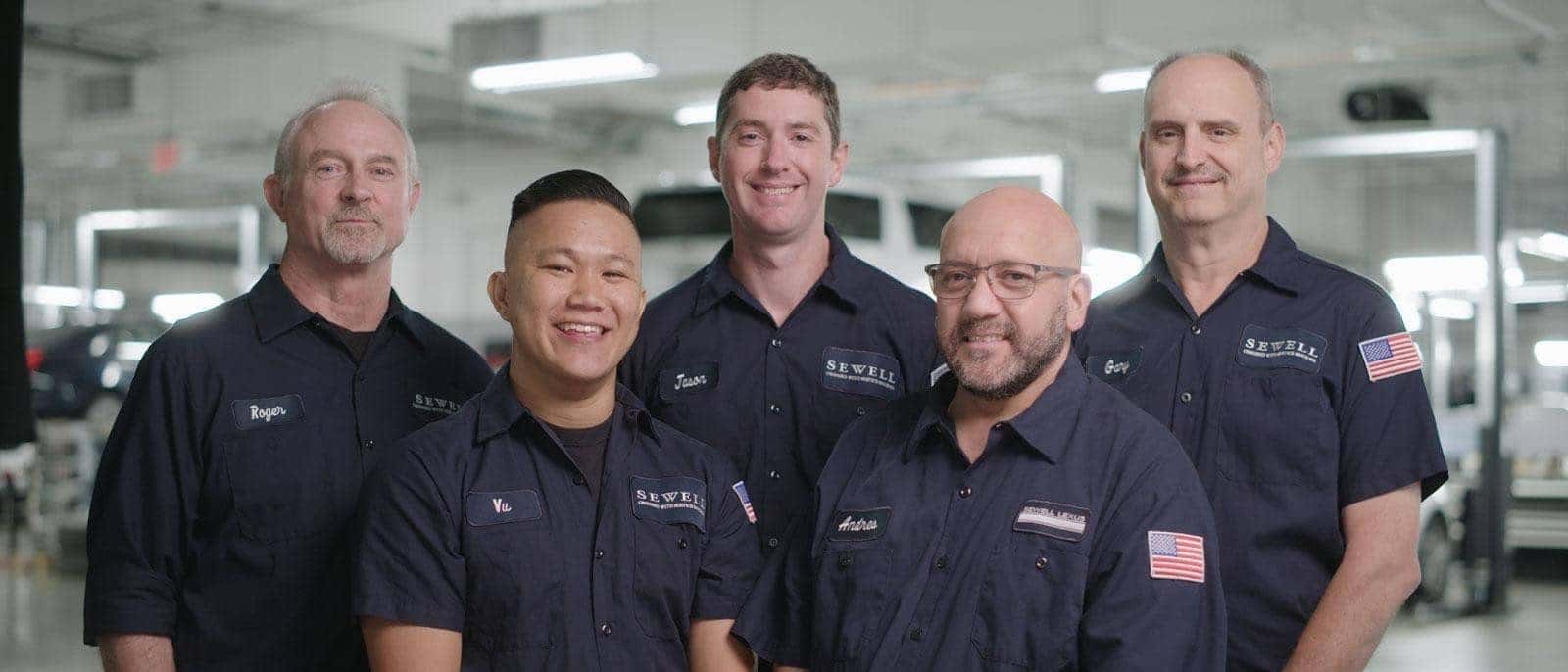 Sewell Technicians standing in a service center