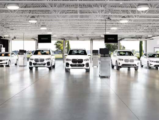 White BMW vehicles in Garage