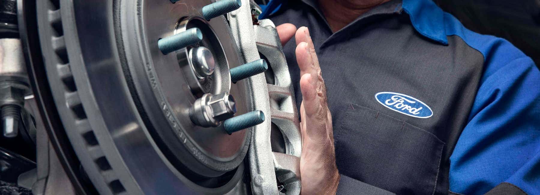 Ford-Technician-installing brakes