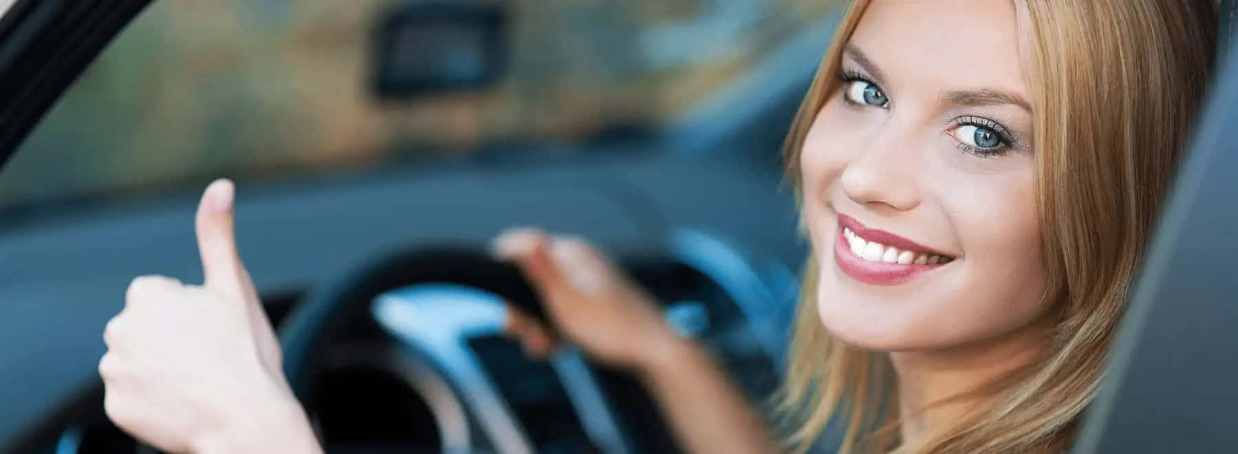 smiling-woman-gives-thumbs-up