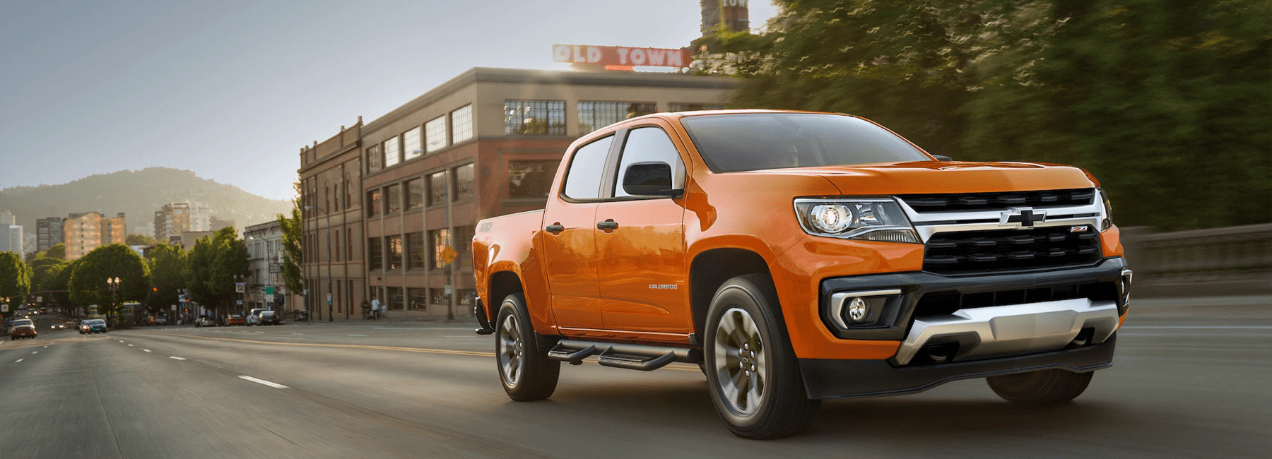 2021 Chevy Colorado drives down town road