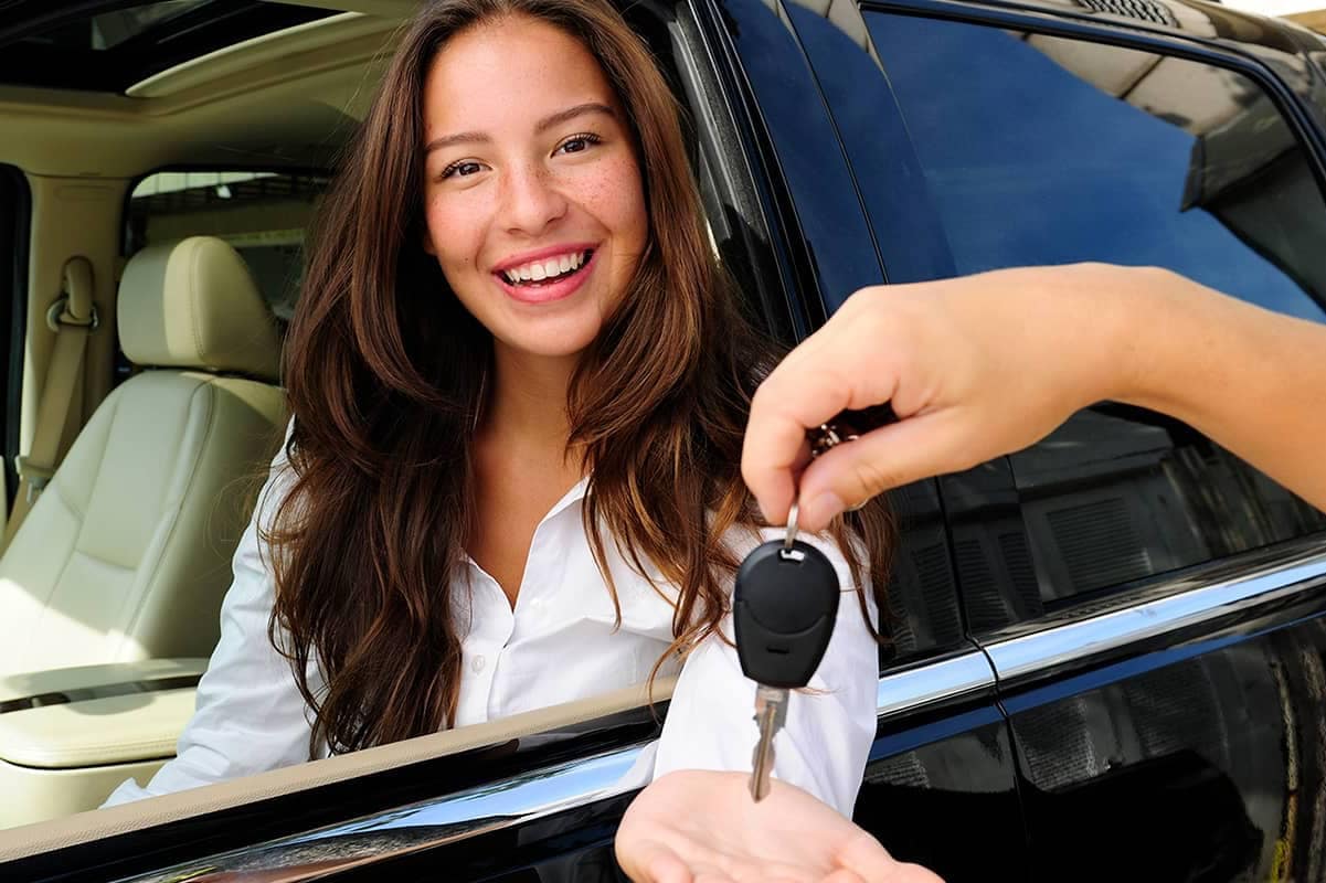 Woman Receiving Car Keys