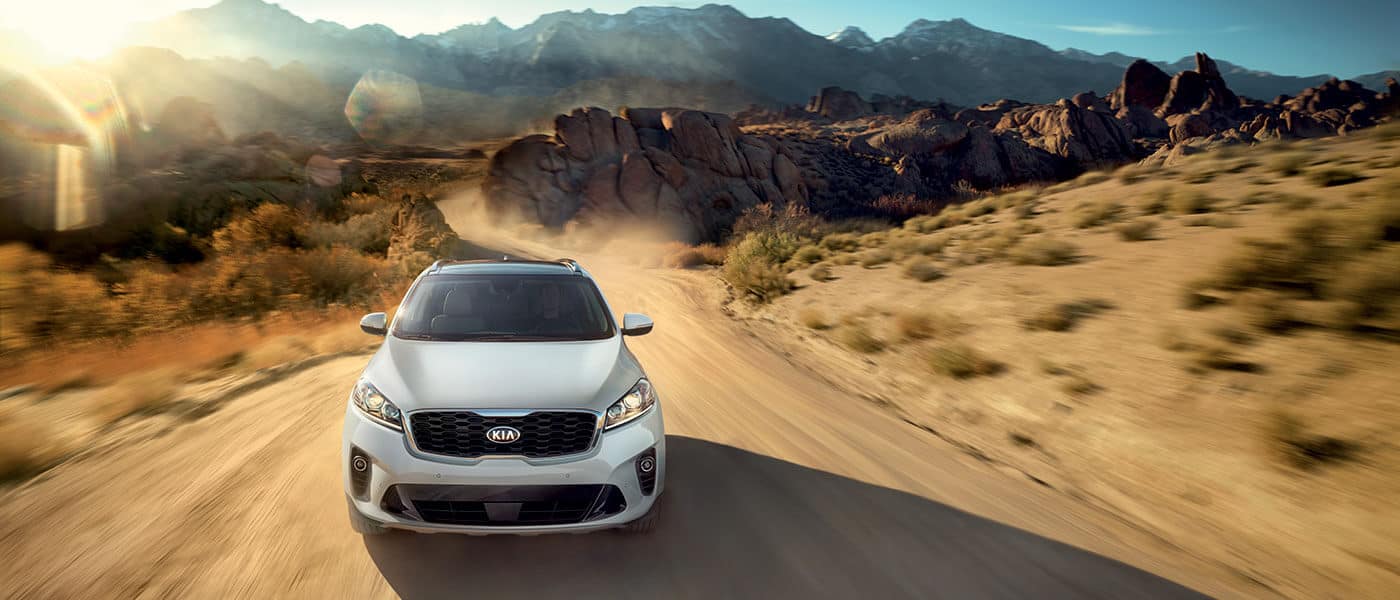 2019 Kia SOrento driving on a dirt road in a desert