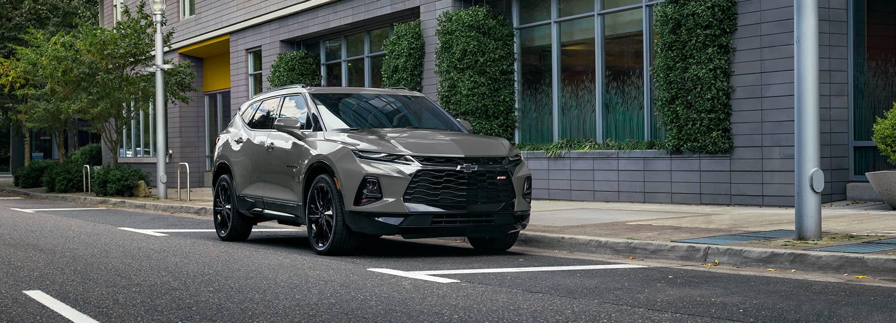 2021 Chevrolet Blazer parked in front of a city building