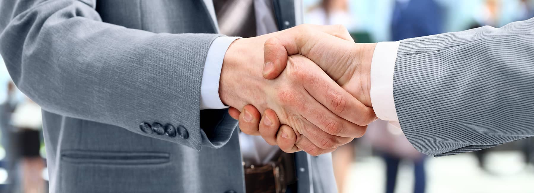 customer and dealer shaking hands
