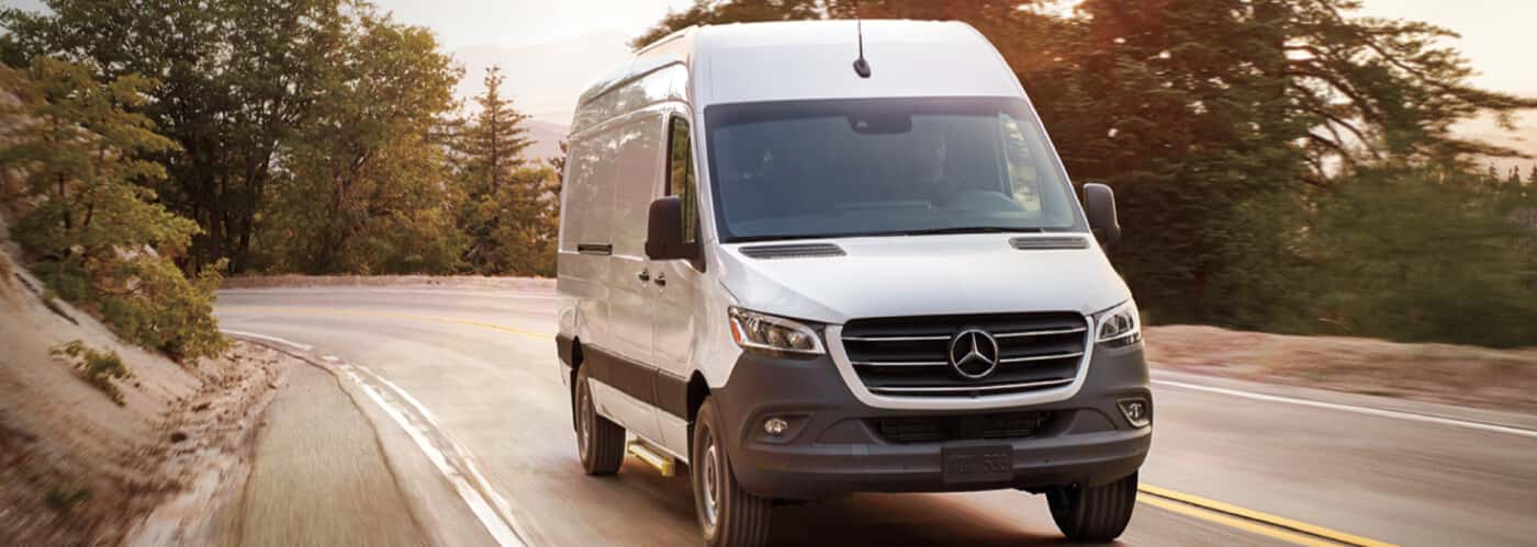 Sprinter-van-driving-through-a-curvy-road.