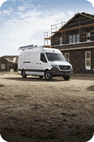 Angled view of a Sprinter Van at a work site