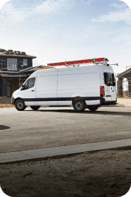 Rear side view of a white sprinter van