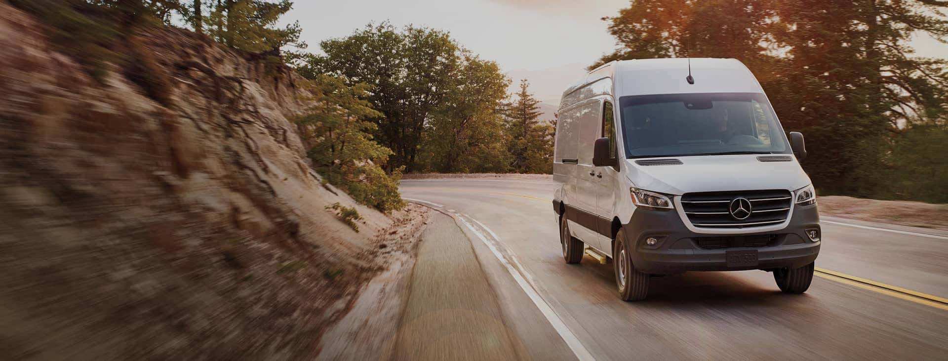 Sprinter Van driving on a road