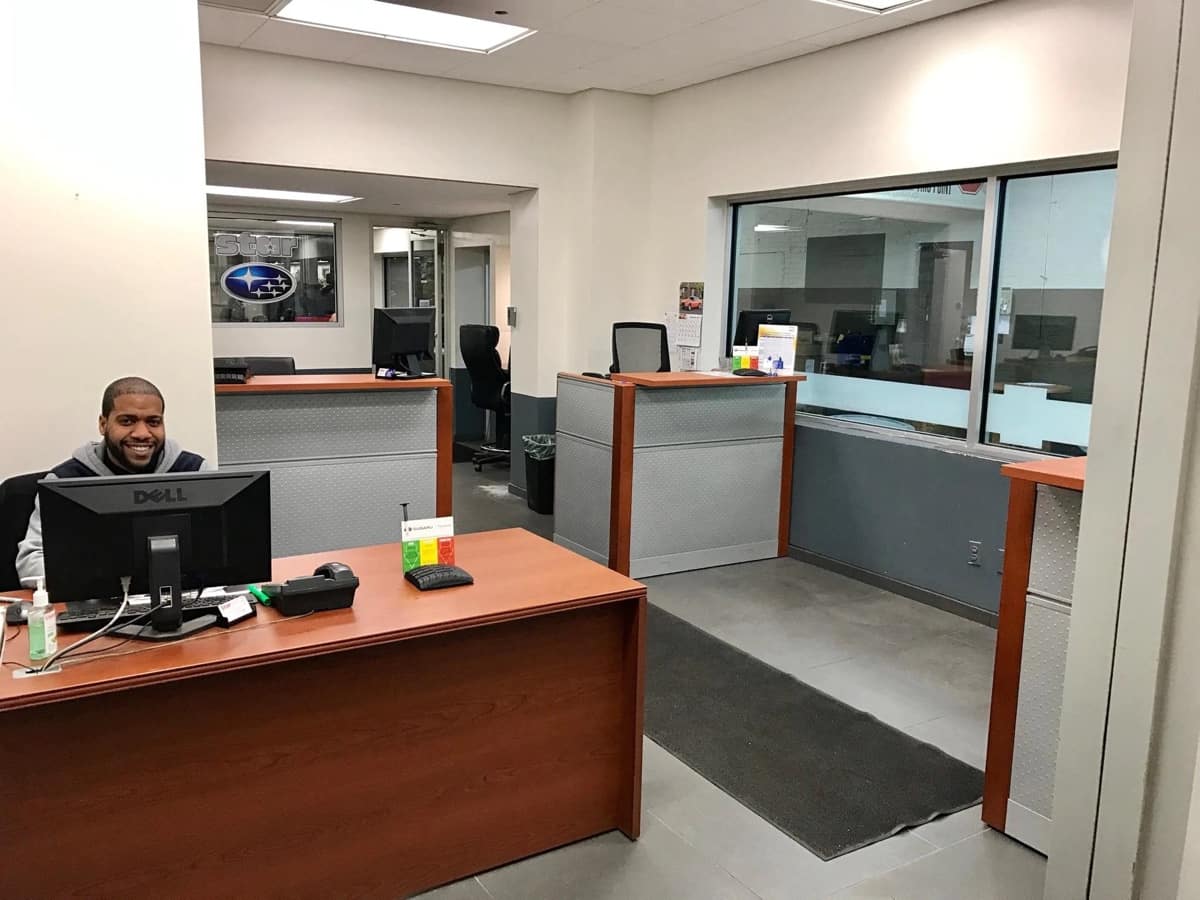 inside-dealership-with-staff