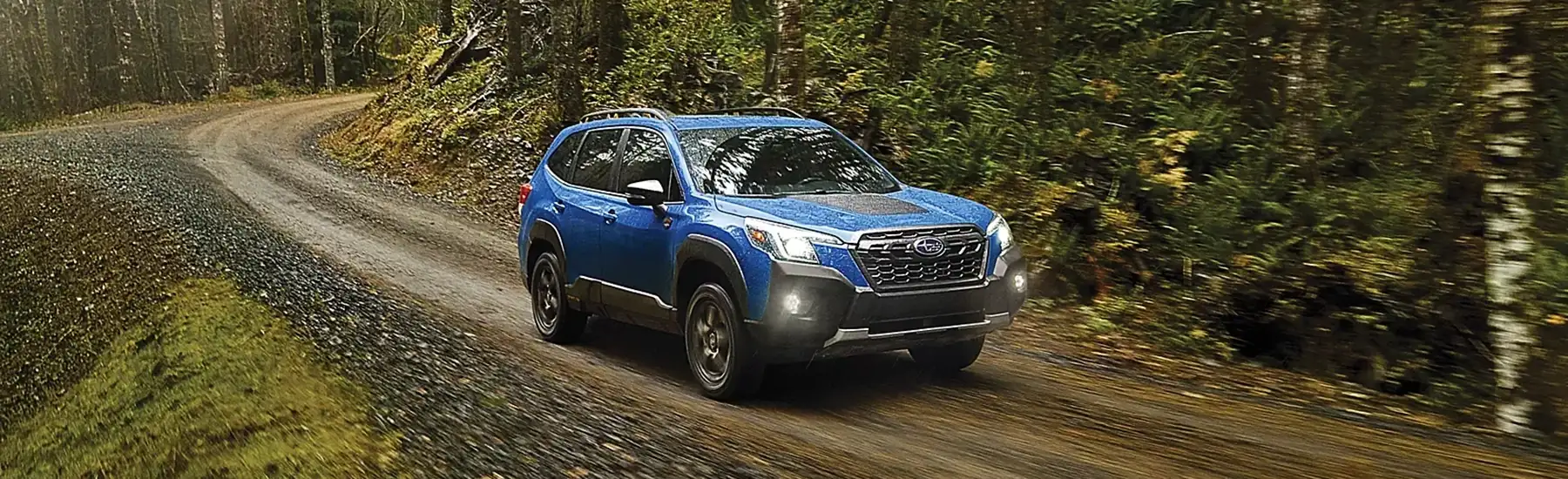 2025 Forester driving down road