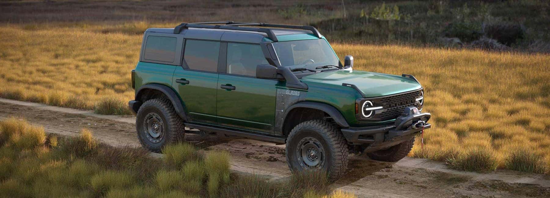 2023 Bronco driving down dirt road