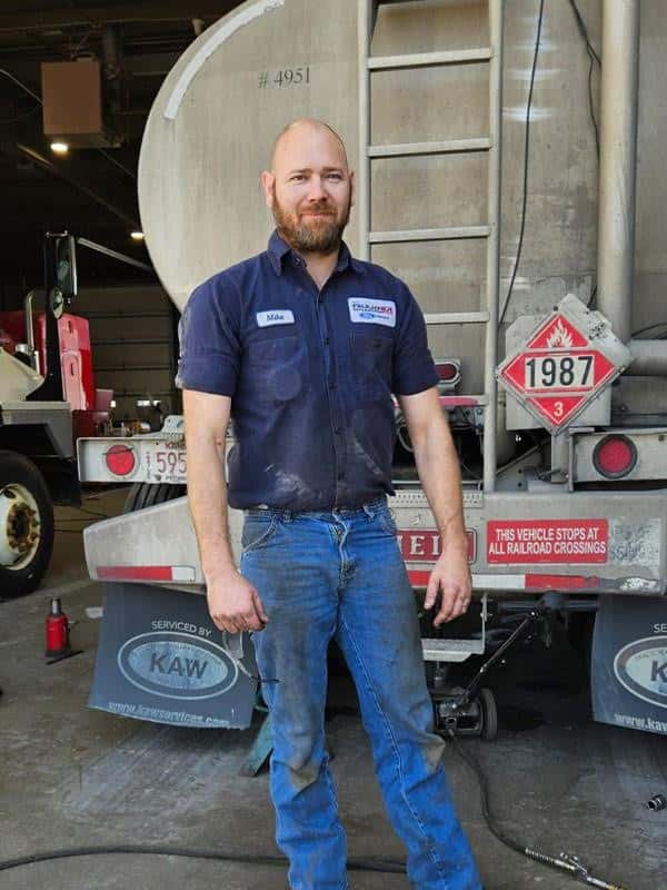 Steve Faulkner Ford Mechanic standing in front of the shop