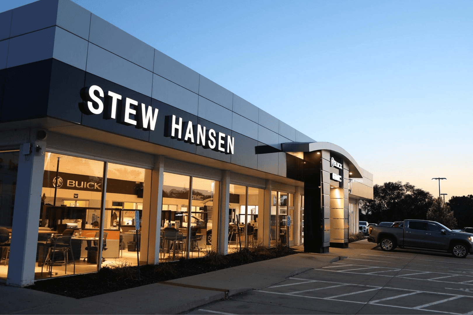 exterior view of dealership as sun sets