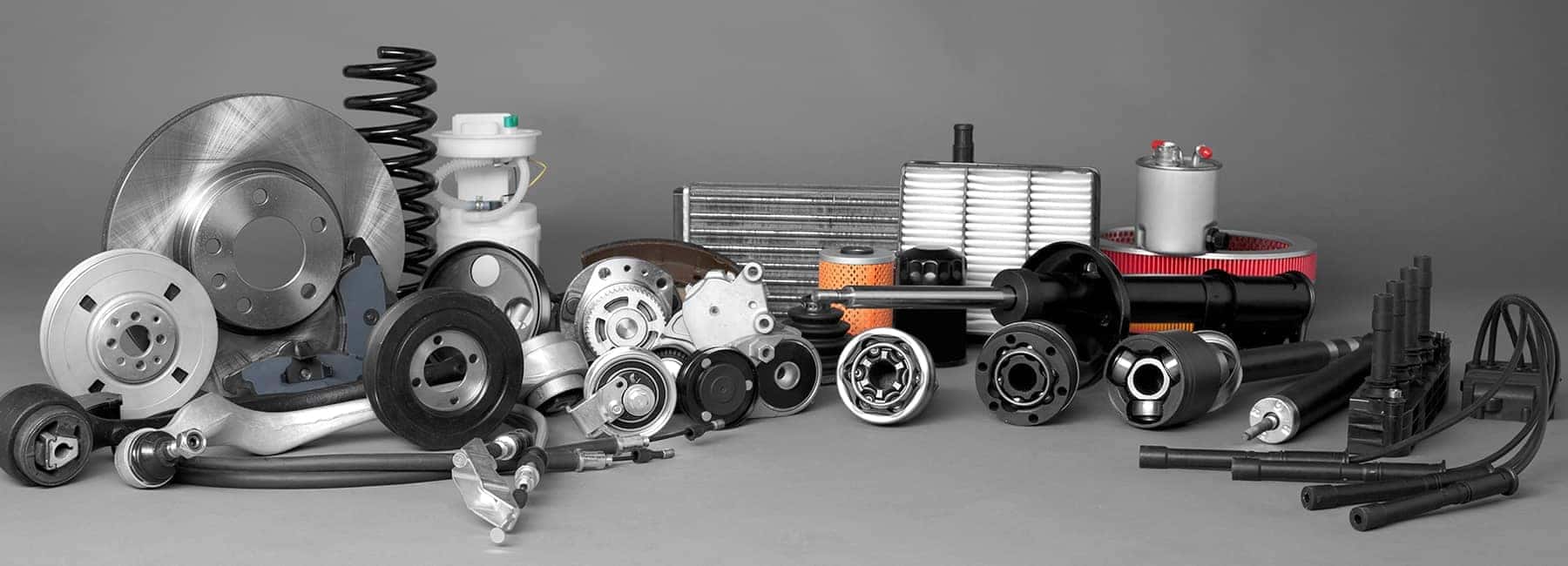 Various Car Parts on Grey Background