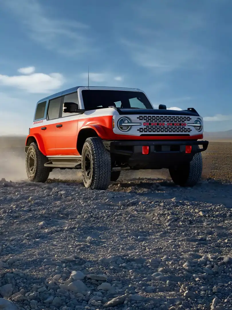 2026 Ford Bronco Stroppe driving on a gravel road
