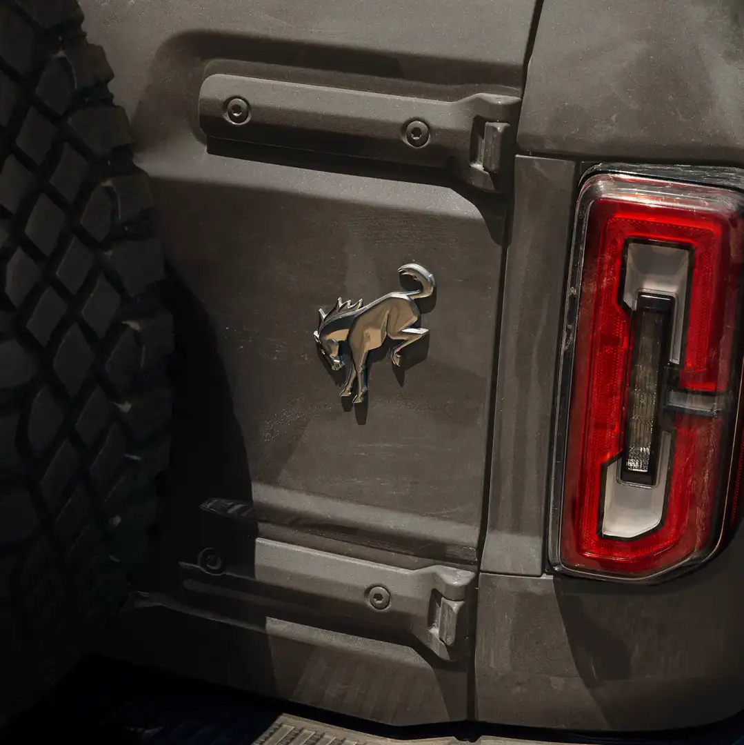 Bronco Icon Badging on the Rear of a Carbon Gray Metallic Bronco