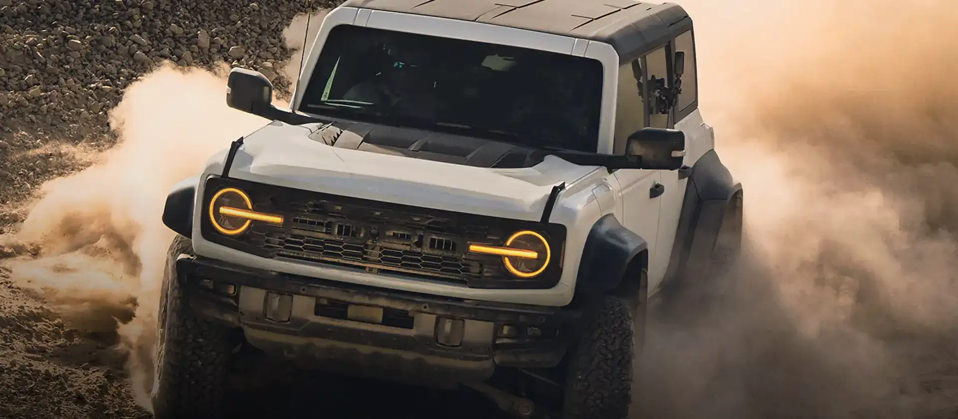 2026 Ford Bronco Tearing over a dirt road