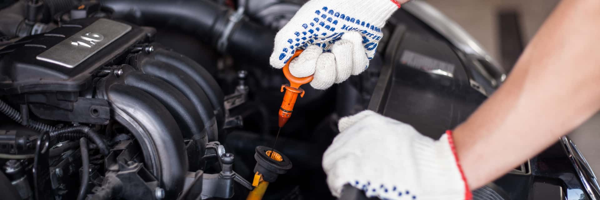 Mechanic performing an oil change