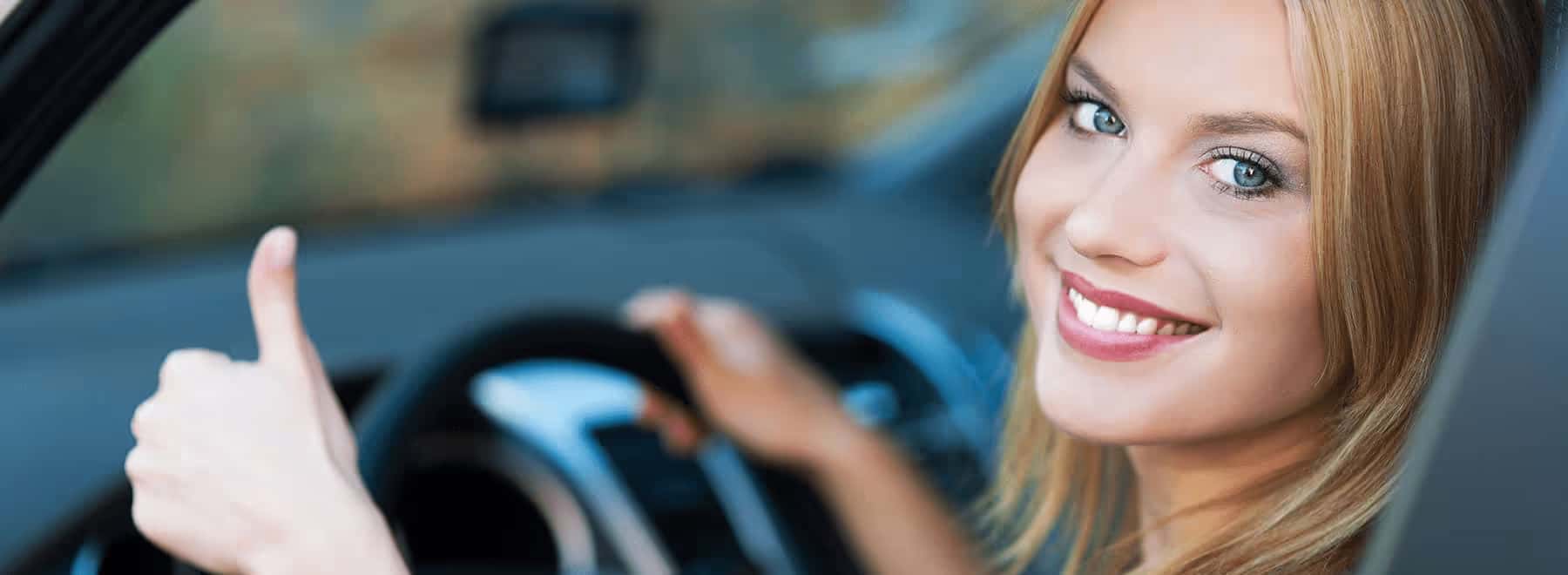 smiling-woman-gives-thumbs-up