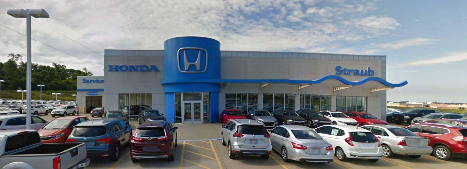 An exterior shot of Straub Honda dealership  during the day