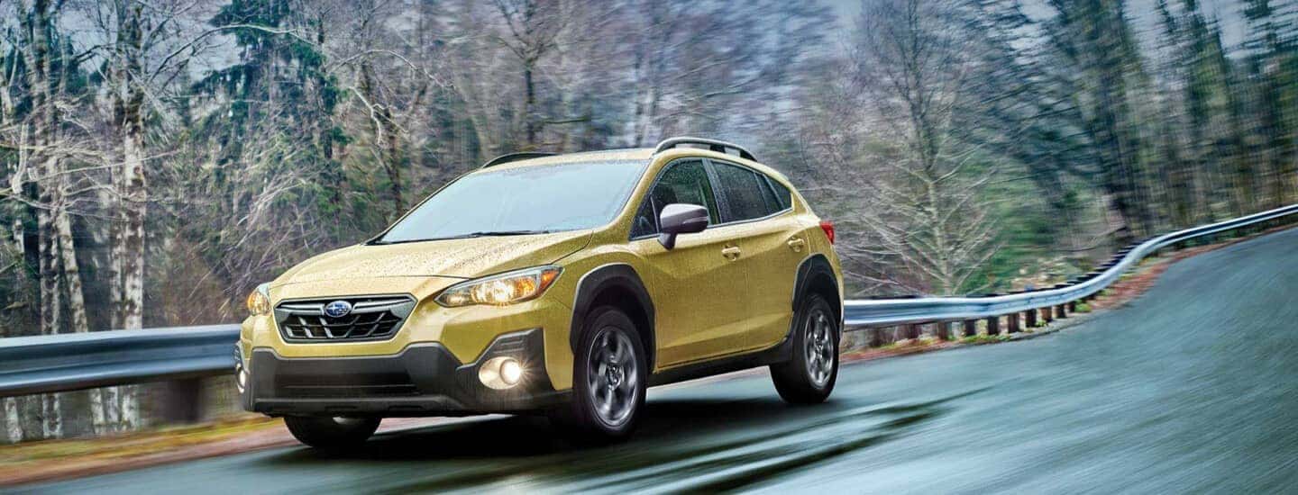 Yellow Subaru vehicle