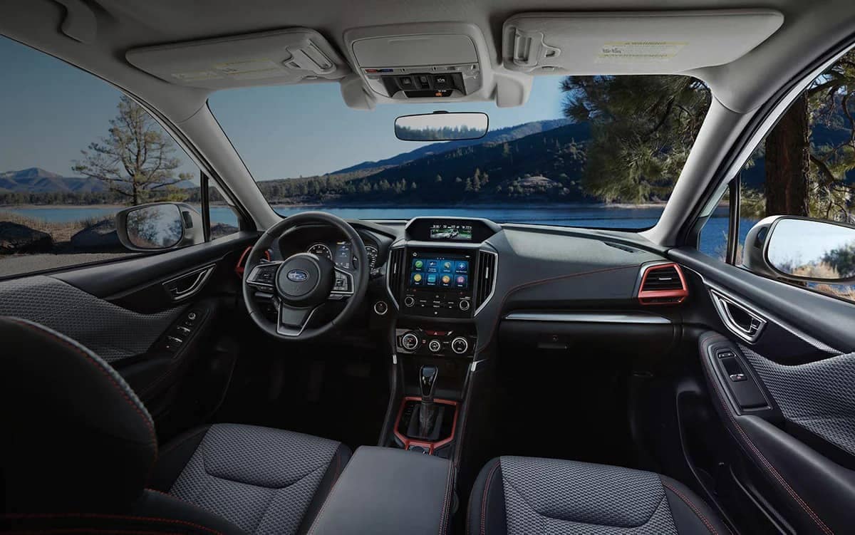 The interior and front dash of the 2021 Forester.