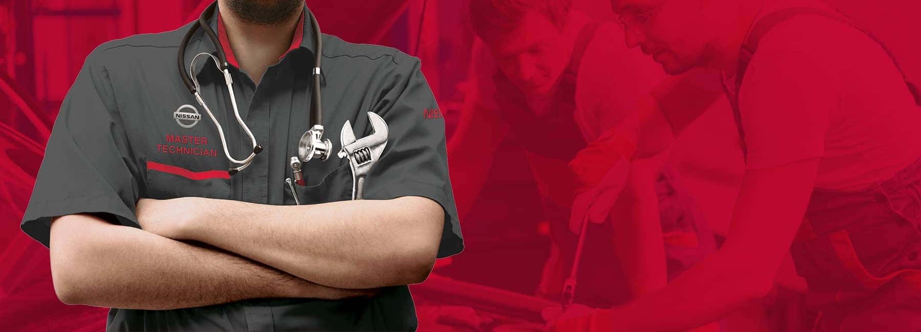 nissan technician with arms crossed