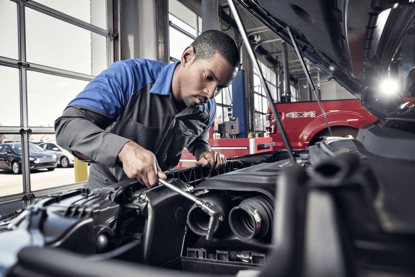 Ford technician performing inspection