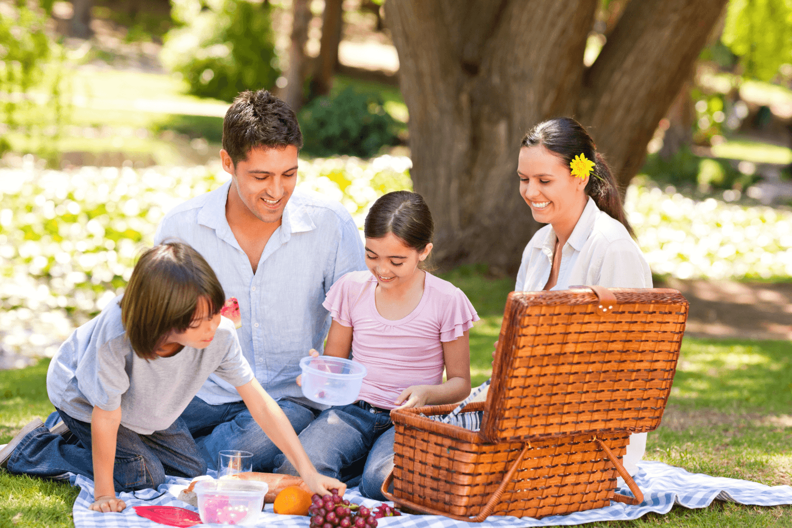 happy family having a picnic in the park
