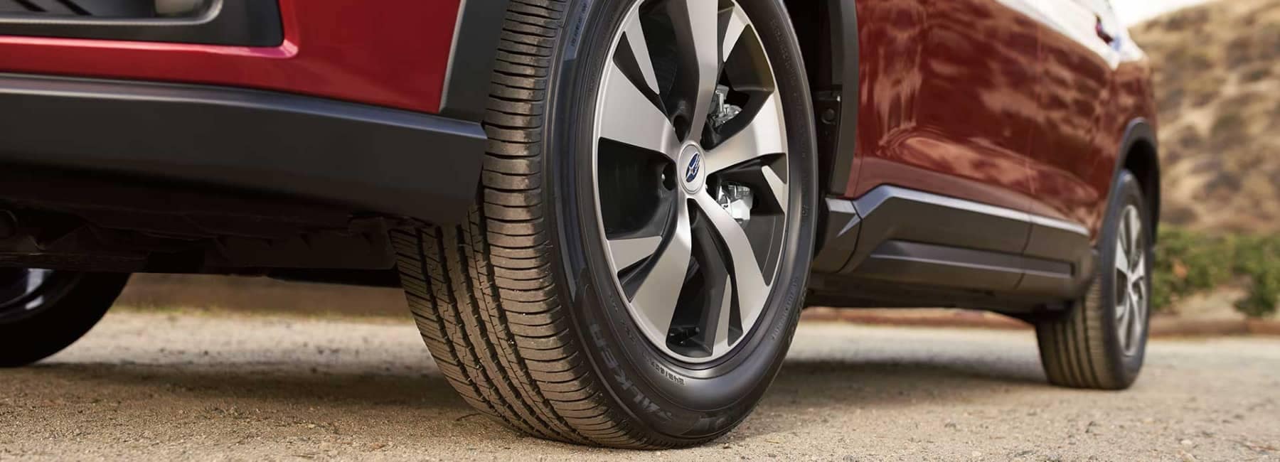 2022 Subaru Ascent- closeup view-front tire-parked-red