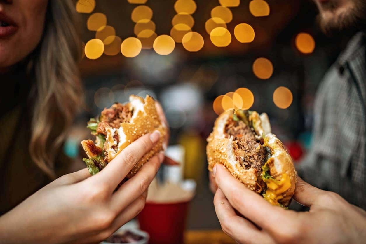 Couple sharing food at Walk-On's Sports Bistreaux