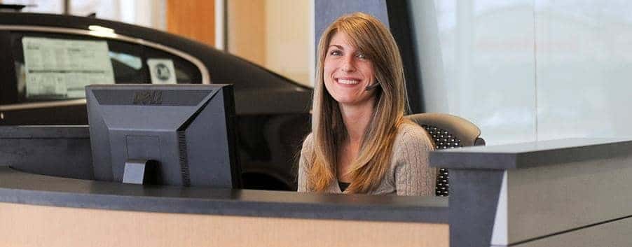 ToddWenzel Receptionnist smiles at the camera