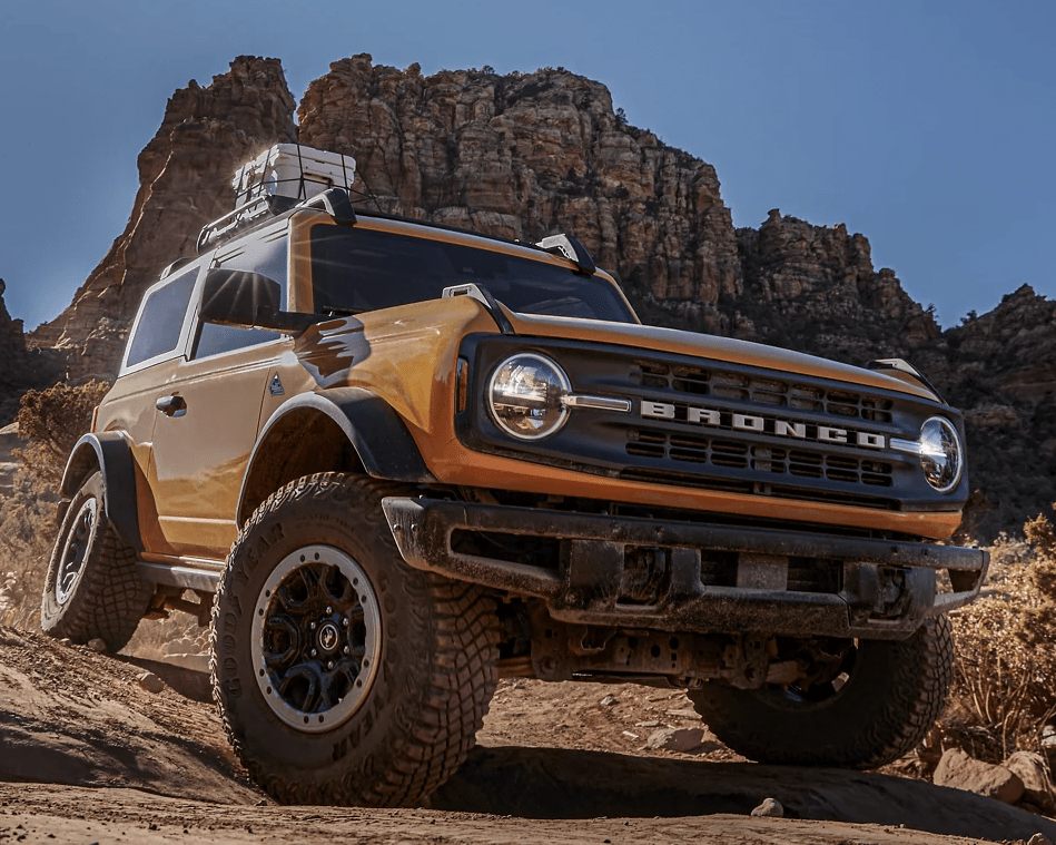 2021 Ford Bronco diving through a rocky desert