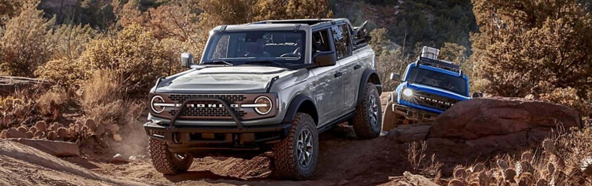 Ford Bronco driving through mud