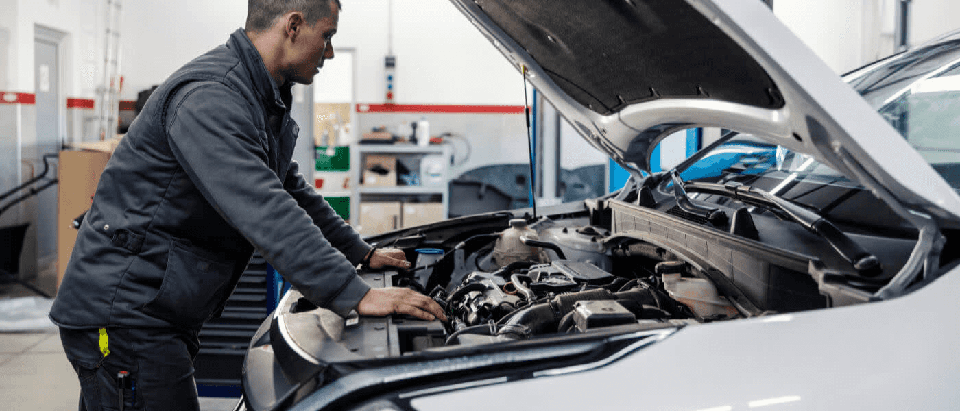 Mechanic working on a car